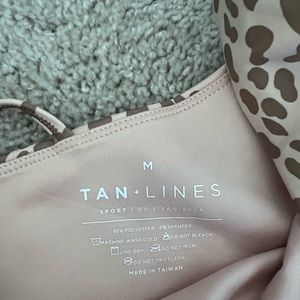 Shop tan lines (by Sivan Ayla) sports bra